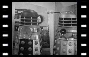 Image of Daleks (with collector disc visible) in control room 