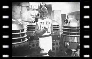 Image of Mavic Chen (kevin Stoney)and Daleks 