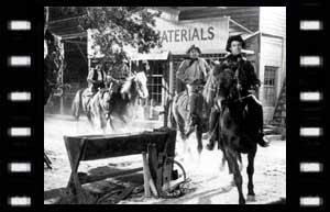 Image of The Clanton gang riding into town
