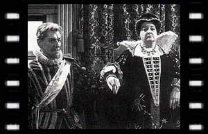 Image of Marshall Tavannes (Andre Morell) Catherine de Medici (Joan Young)