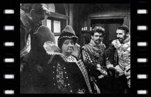 Image of Catherine de Medici (Joan Young) and her court