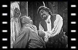Image of Captain Pike (Michael Godfrey) stabing Cherub (George A. Cooper)