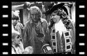 Image of Polly with an injured Ben, Tom (Mike Lucas) and the Squire (Paul Whitsun-Jones)