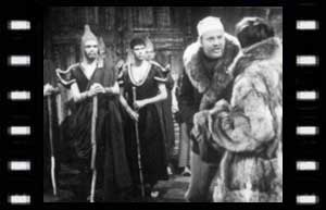 Image of Travers (Jack Watling) & The Doctor with Monks looking on