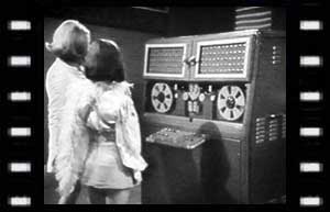 Image of Isobel (Sally Faulkner), and Zoe at the IE computer 