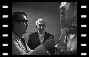 Image of Gregory (Ian Fairbairn), & Tobias Vaughn (Kevin Stoney) experiment with Cyberman