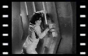Image of Zoe trying to open a door