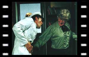 Image of Lieutenant John Andrews (Ian Marter) being hit by the Doctor