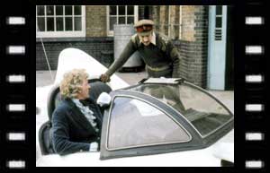 Image of the Doctor in the Whomobile, and the Brigadier