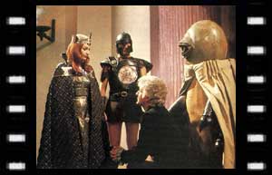 Image of Queen Thalira (Nina Thomas), The Doctor, & Alpha Centauri (Stuart Fell) 