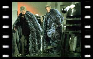 Image of the Doctor, Taron (Bernard Horsfall), and a Dalek