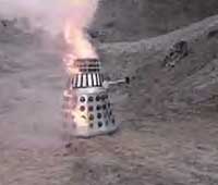 Image of a Dalek on fire