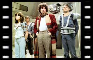 Image of Sarah Jane and the Doctor being taken presented to the commander