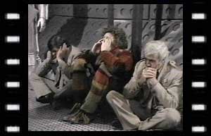 Image of Lester (William Marlowe), Doctor, and Stevenson (Ronald Leigh-Hunt) do hear no evil, see no evil, speak no evil